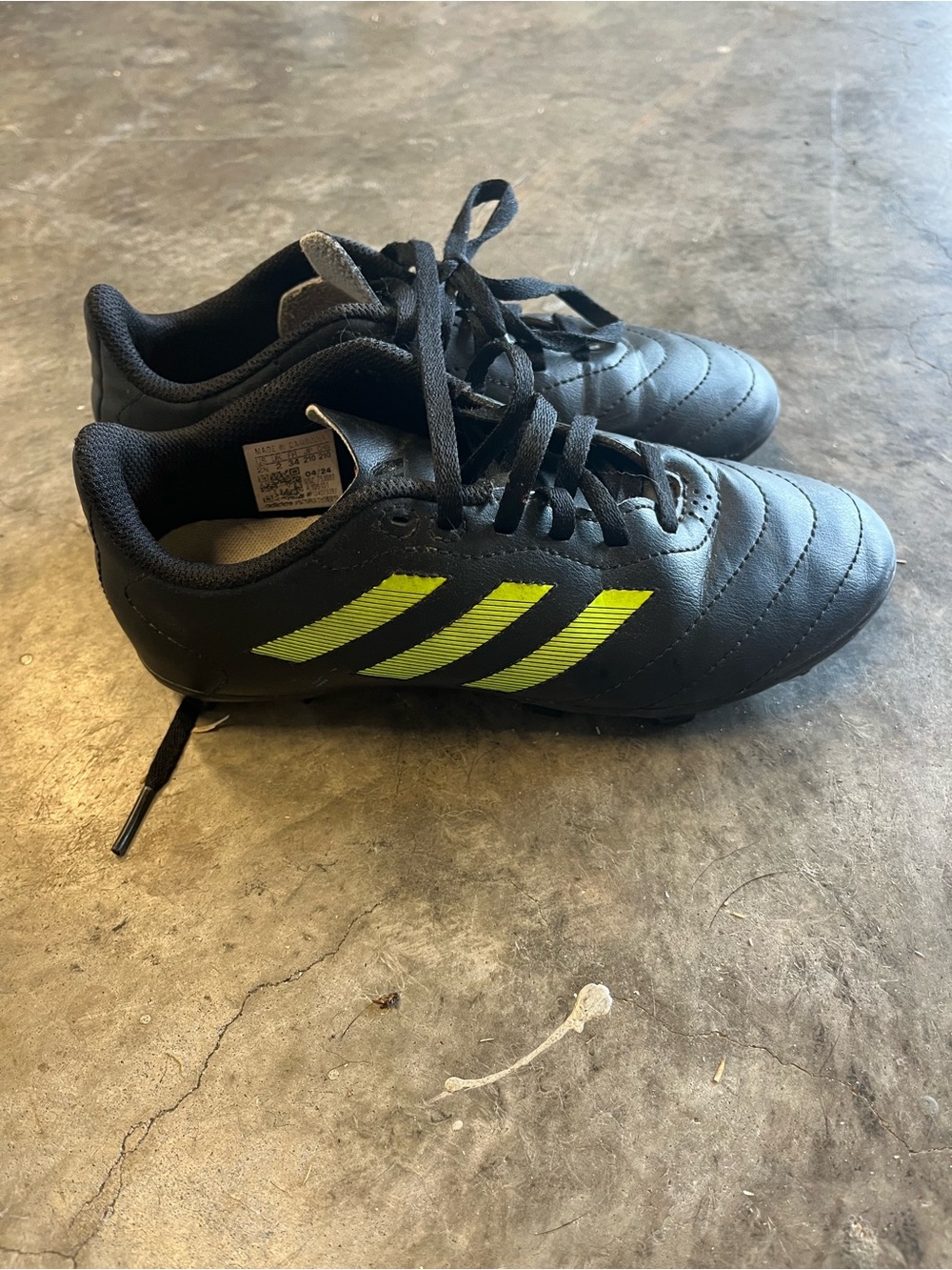 Kids Black Soccer Cleats with Neon Yellow Stripes size 2.5